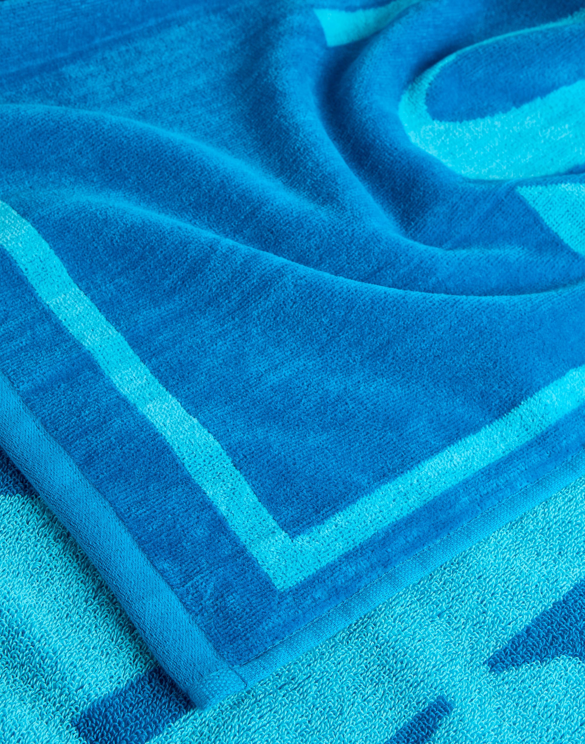 sundek-telo-jacquard-in-spugna-con-maxi-logo-100x180-cm image 2