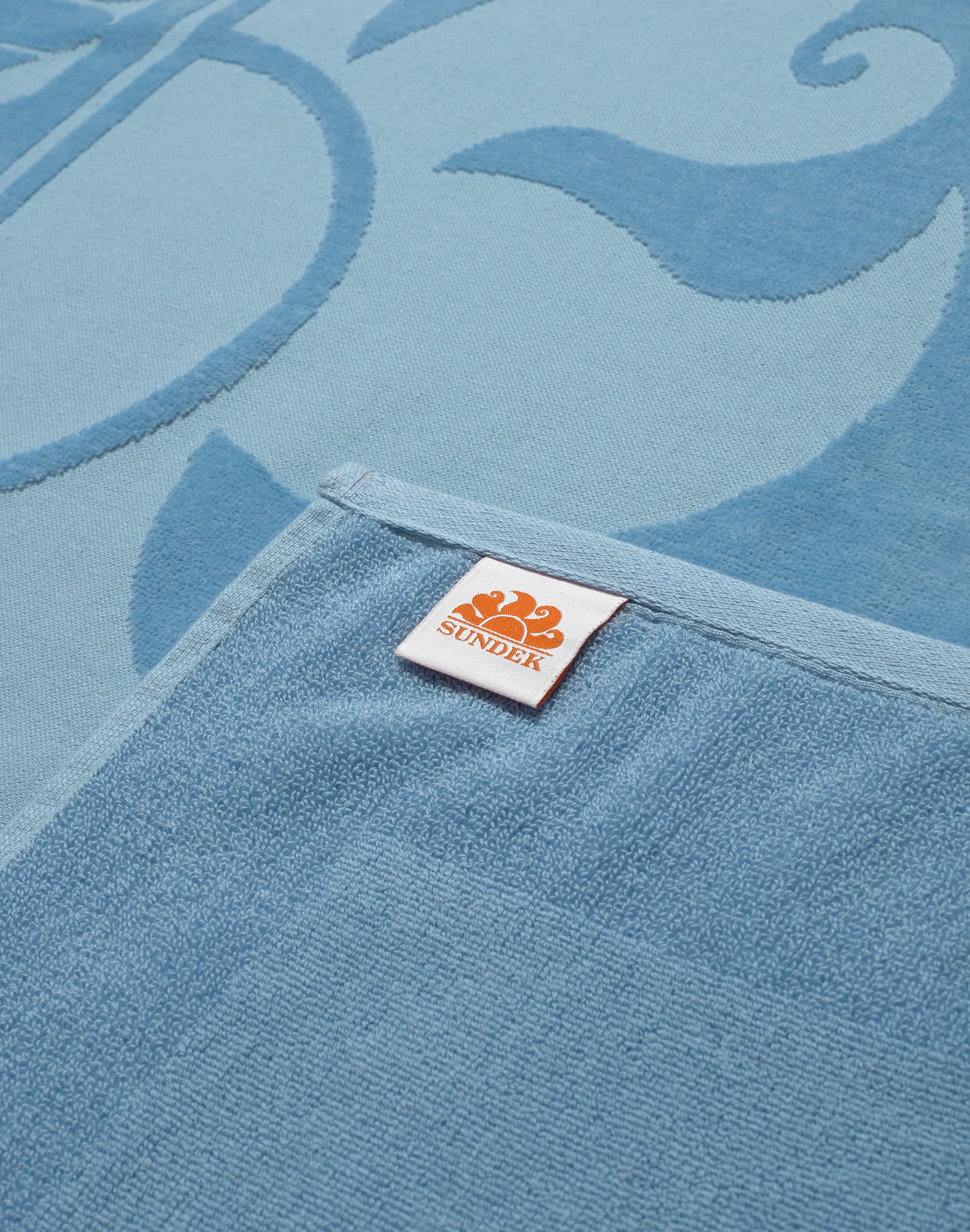 sundek-am372atc1000-telo-mare-in-spugna-jacquard-con-logo image 2