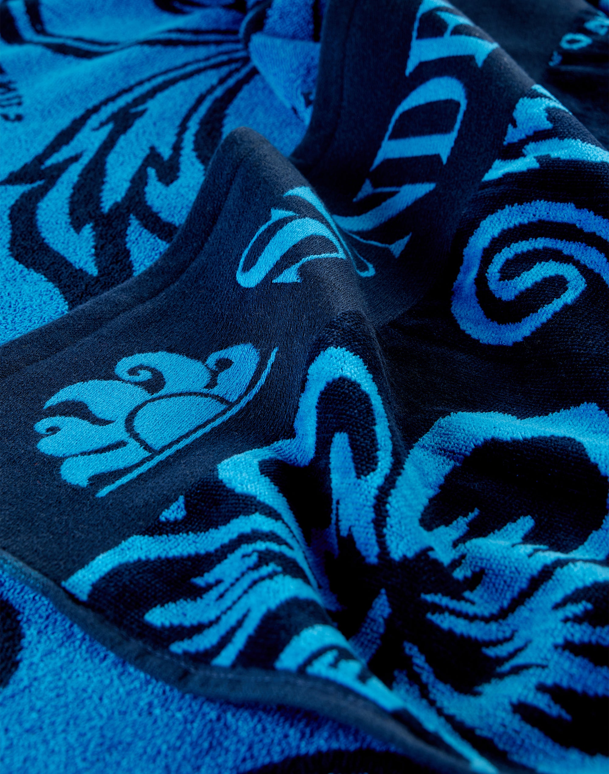 sundek-goldenwave-telo-mare-in-spugna-jacquard-hibiscus-sk23-100x180 image 2