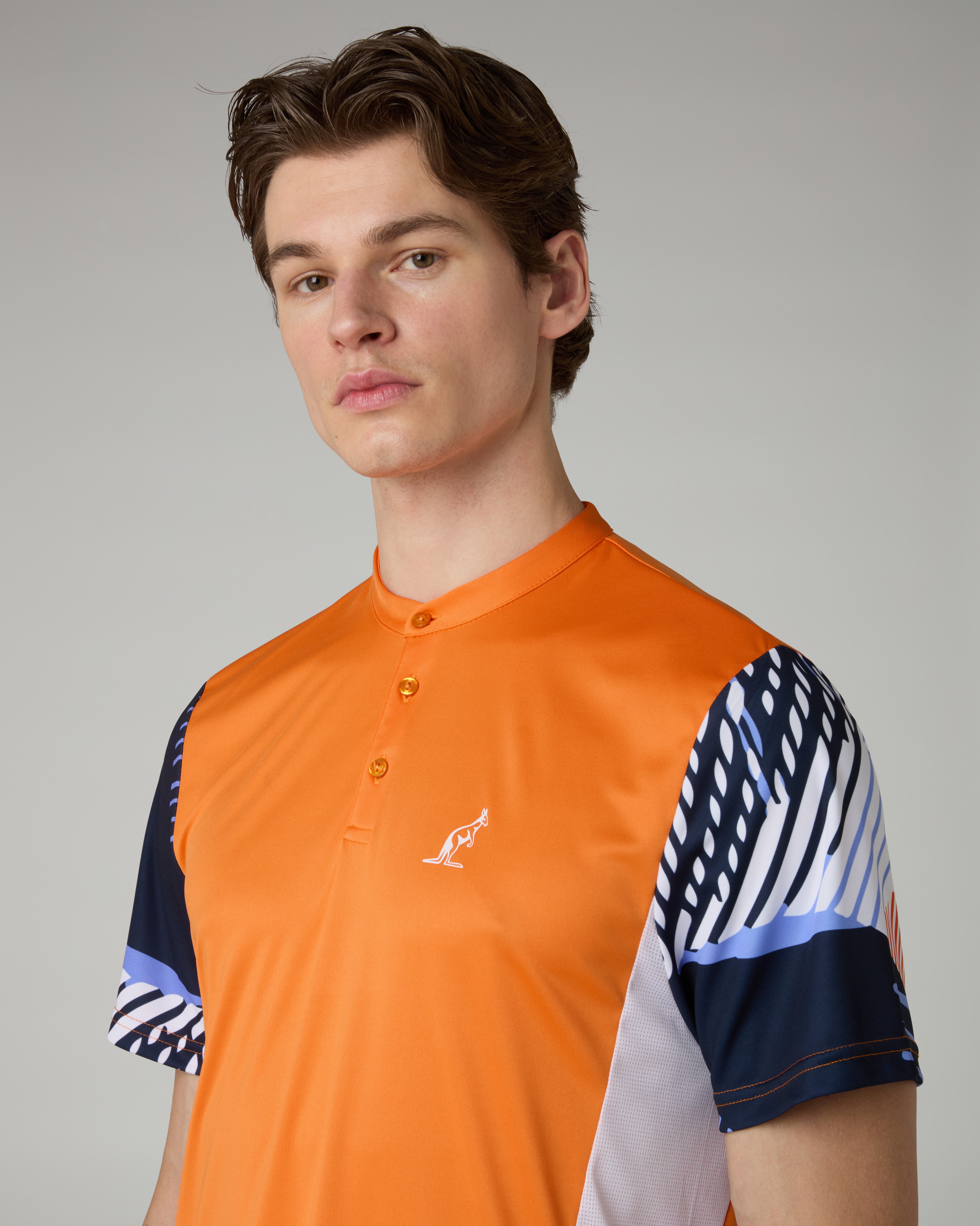 australian-absinth-polo-arancio-acceso-tecnica image 4