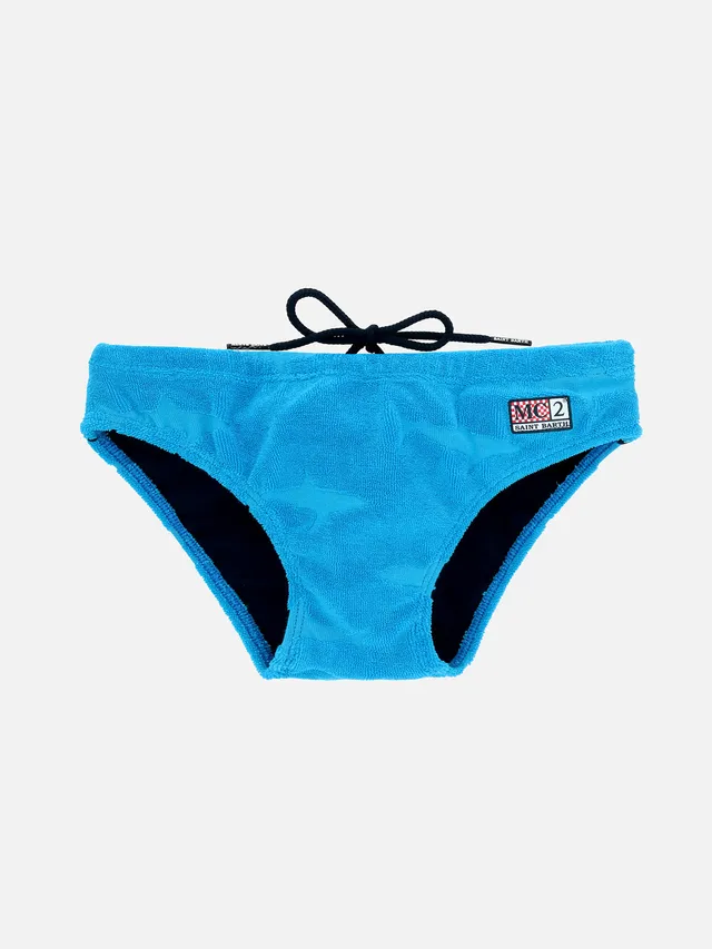 mc2-saint-barth-billy-slip-da-bagno-da-bambino-in-spugna-turchese-con-squali-in- image 1